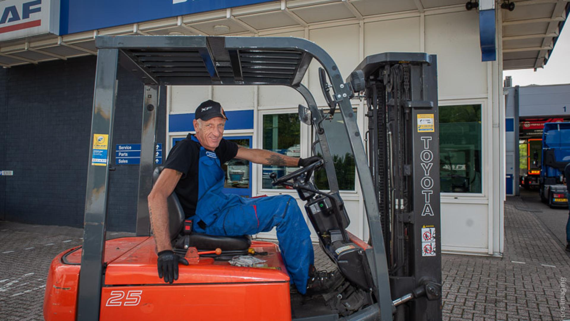 Man op heftruck